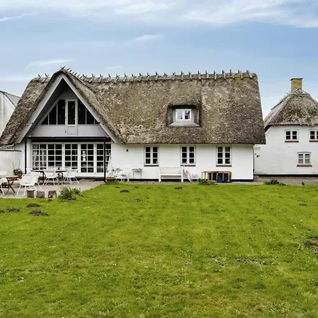 By The Bay A Thatched House Lies So Beautifully *
