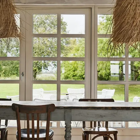 By The Bay A Thatched House Lies So Beautifully * Norre Aby