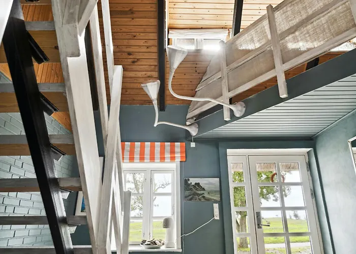 By The Bay A Thatched House Lies So Beautifully *