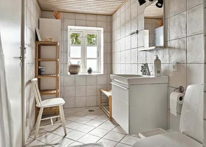 By The Bay A Thatched House Lies So Beautifully *